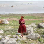 Kihnu woman with phone_Renee Altrov WP